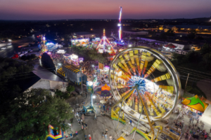 An aerial view of the carnival at the Founders' Day celebrations in Dripping Springs, Texas on April 26th, 2024.