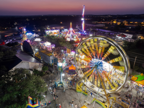 An aerial view of the carnival at the Founders' Day celebrations in Dripping Springs, Texas on April 26th, 2024.